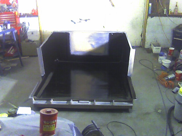 The first layer of gel-coat cures (slowly!) The first layer of gel-coat cures (slowly!)